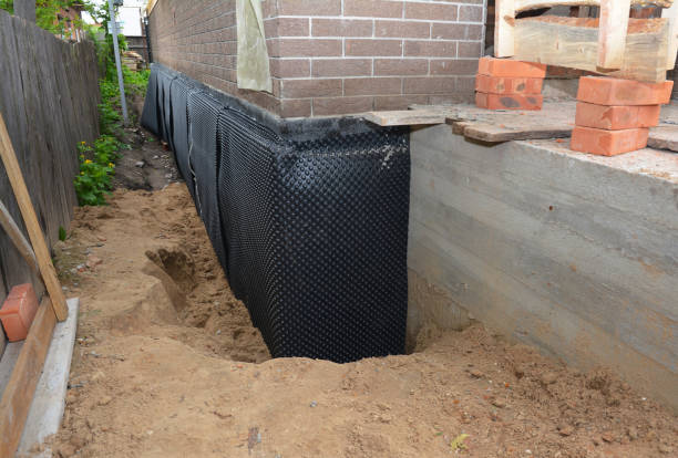 Happy homeowners after waterproofing job in Five Points